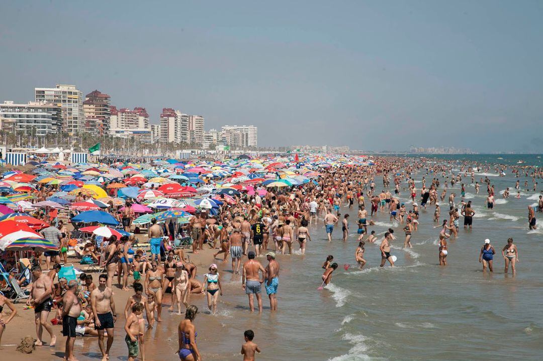 Turistas en la Playa.