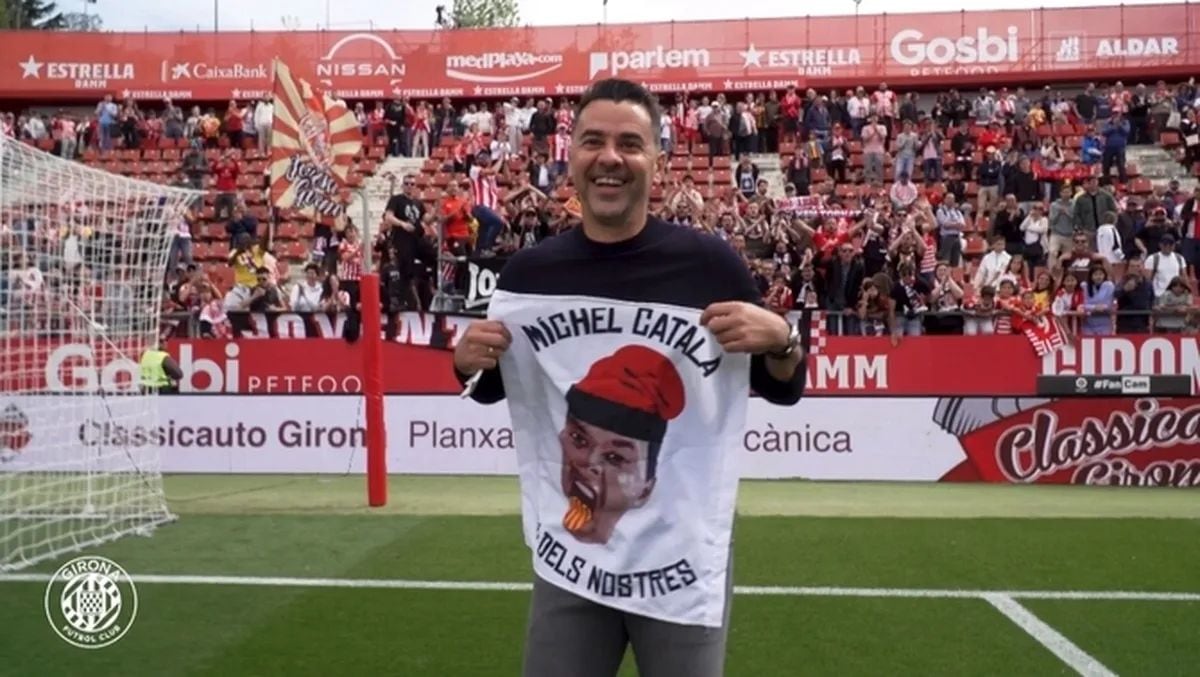 Michel amb pancarta de "Michel Català"