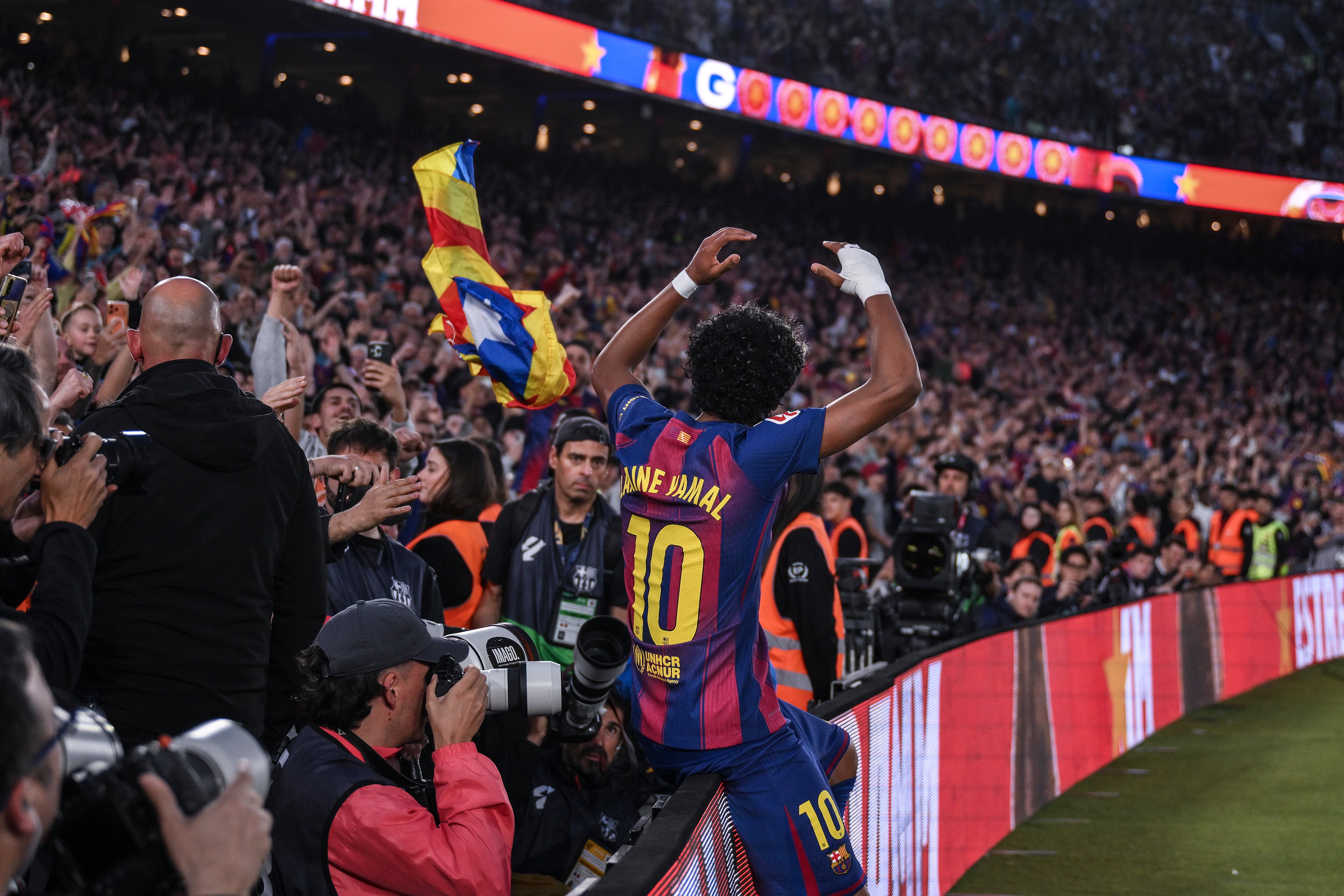 BARCELONA, SPAIN - APRIL 11: Lamine Yamal of FC Barcelona celebrates their team's third goal during the LaLiga EA Sports match between FC Barcelona and RCD Espanyol de Barcelona at Spotify Camp Nou on April 11, 2026 in Barcelona, Spain. (Photo by David Ramos/Getty Images)
