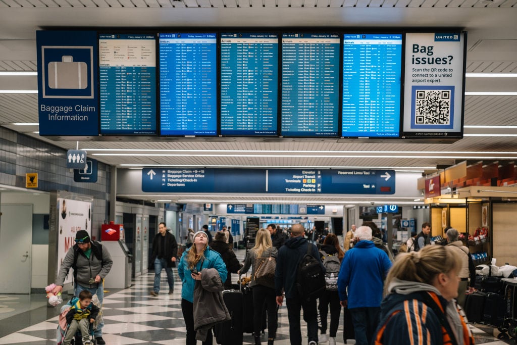 Viajeros en el aeropuerto O&#039;Hare de Chicago.