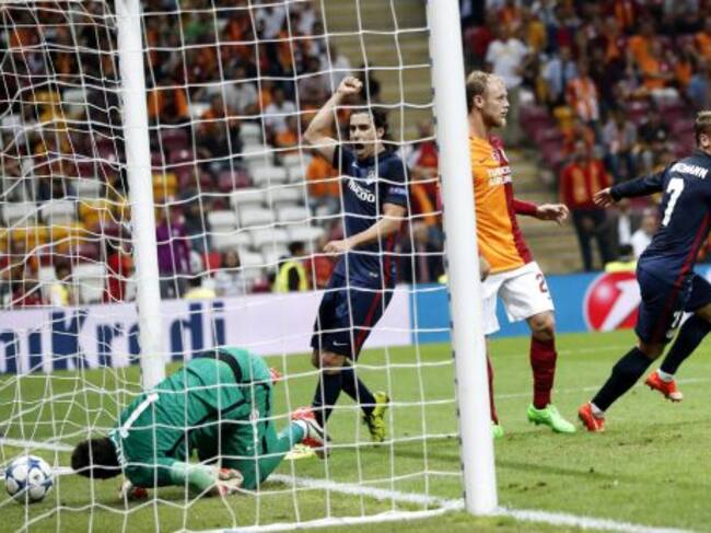 Tiago celebra un gol de Griezmann.