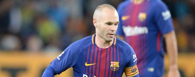 Iniesta, durante un partido con el Barça