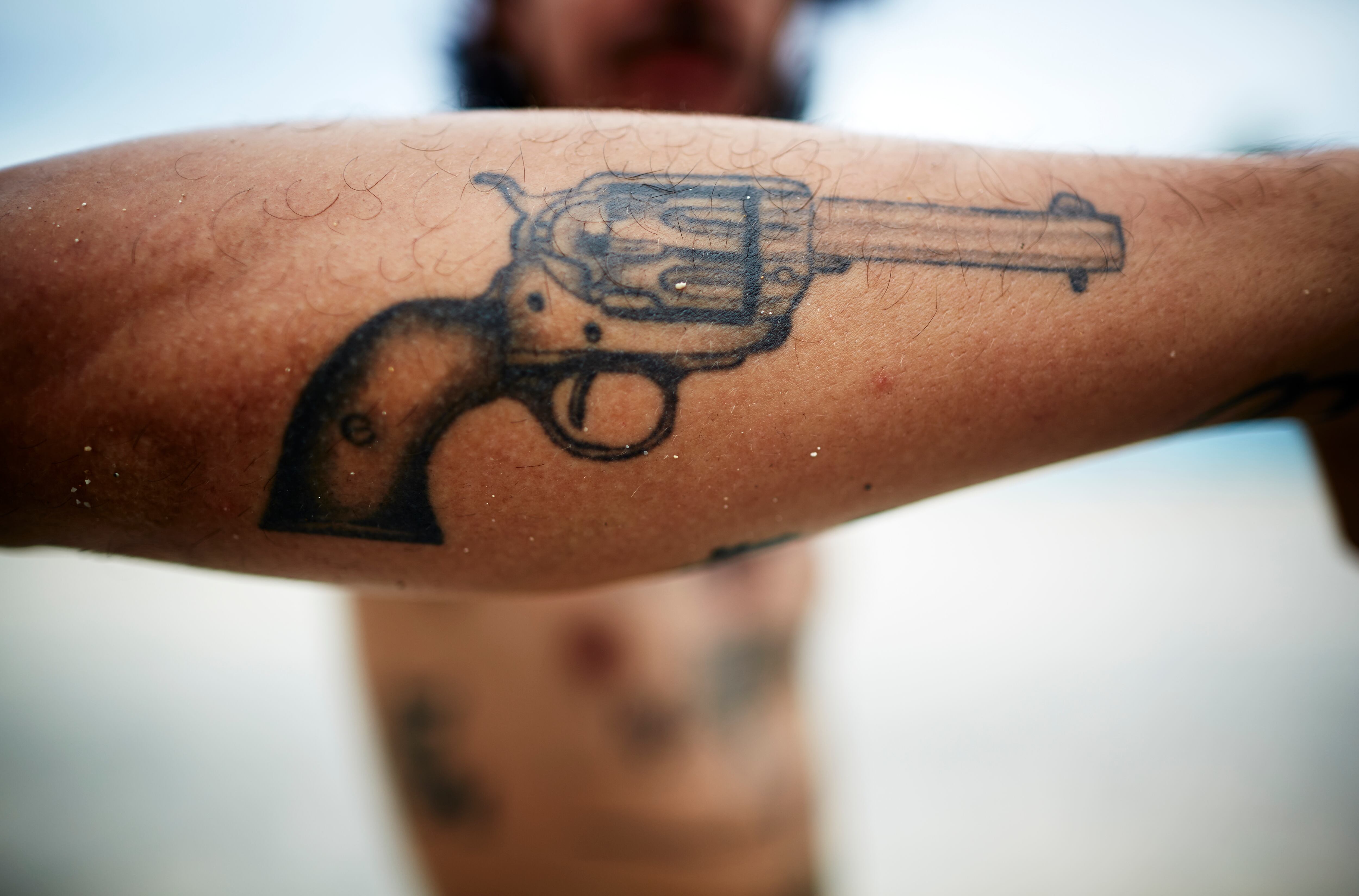 Tatuaje de una pistola