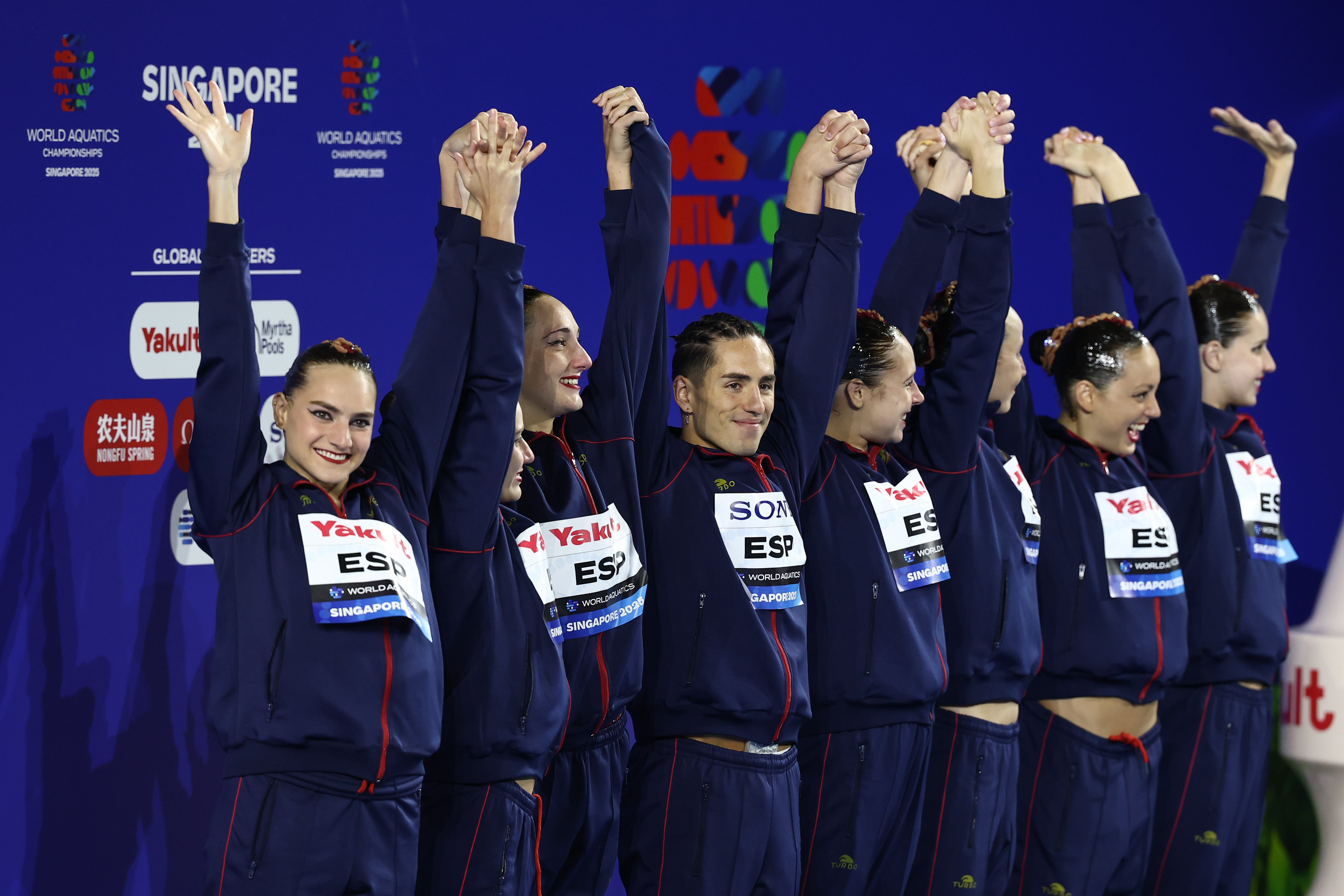 SINGAPORE, SINGAPORE - JULY 20: Bronze medalists Team Spain celebrate on the podium during the Team Free medal ceremony on day 10 of the Singapore 2025 World Aquatics Championships at World Aquatics Championships Arena on July 20, 2025 in Singapore. (Photo by Yong Teck Lim/Getty Images)