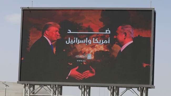 Cartel en Sana (Yemen) en el que se ve a Donald Trump y Benjamin Netanyahu.