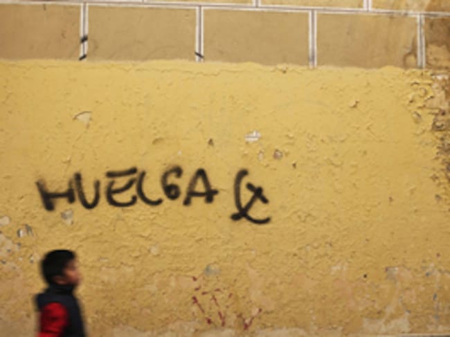 Pintada a favor de la huelga general en una calle del centro de Madrid