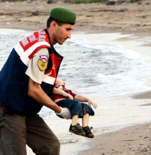 REFILE - CORRECTING BYLINEATTENTION EDITORS - VISUALS COVERAGE OF SCENES OF DEATH OR INJURYA Turkish gendarmerie carries a young migrant, who drowned in a failed attempt to sail to the Greek island of Kos, in the coastal town of Bodrum, Turkey, September 