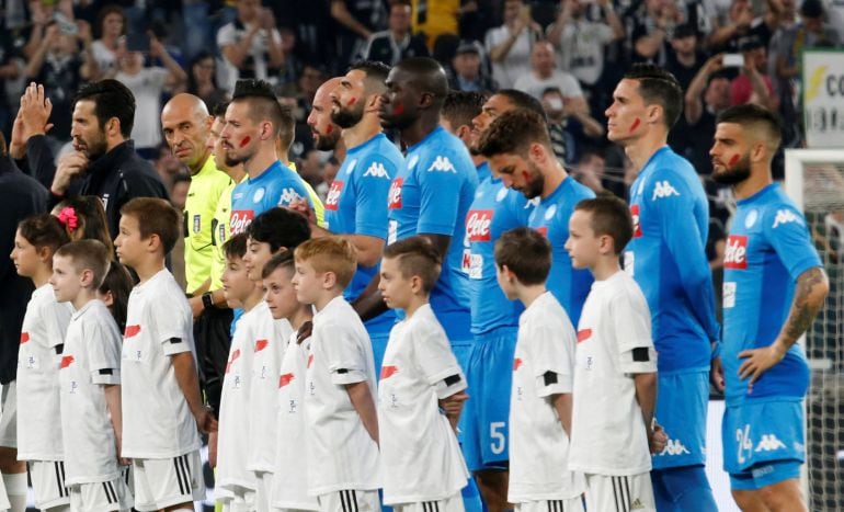 Los jugadores del Nápoles y la Juve, con la cara pintada antes del encuentro. 