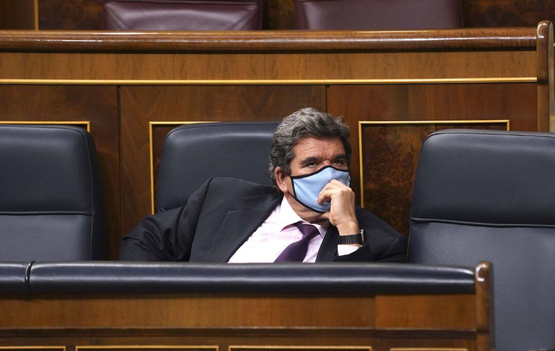 El ministro de Inclusión, Seguridad Social y Migraciones, José Luis Escrivá, durante una sesión plenaria en el Congreso de los Diputados. 