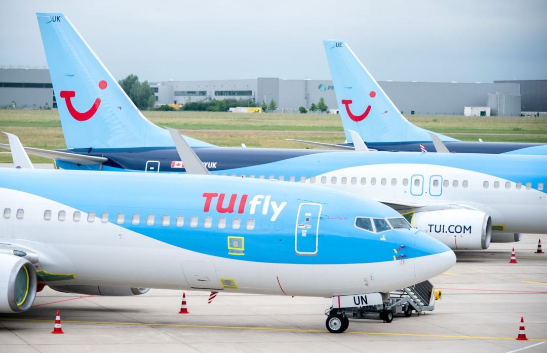 Lower Saxony, Langenhagen: Aircraft belonging to the airline TUIfly park at Hannover Airport.