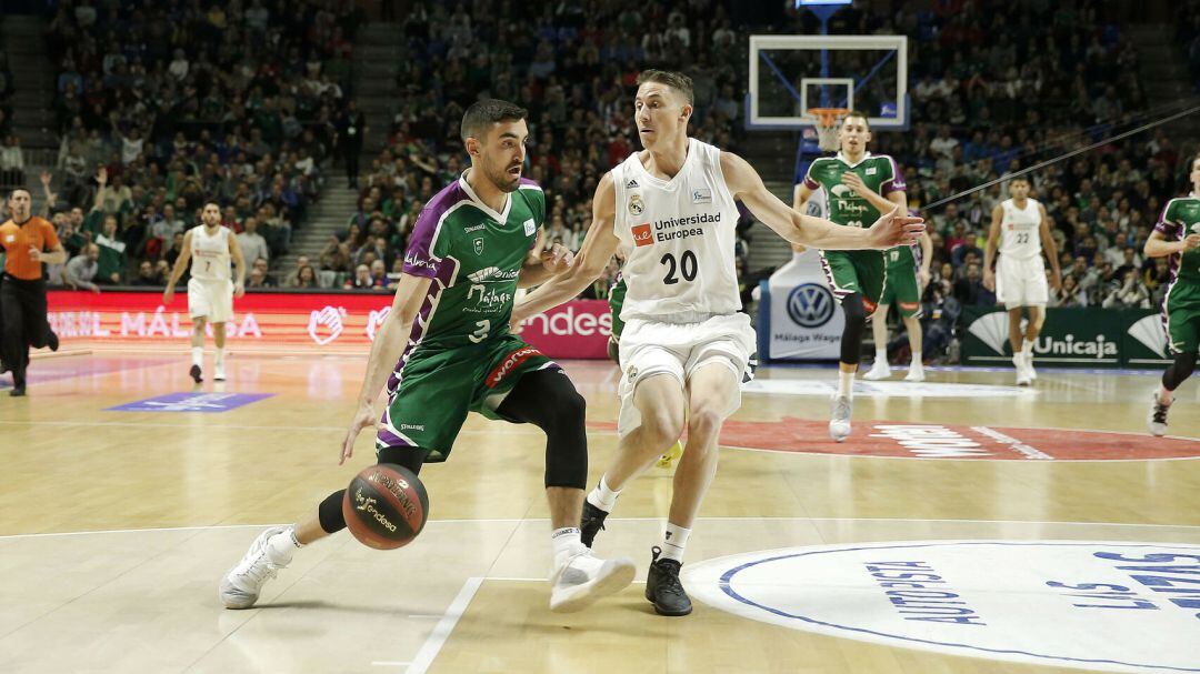 Jaime Fernández y Jaycee Carrol, en un partido de Liga Endesa