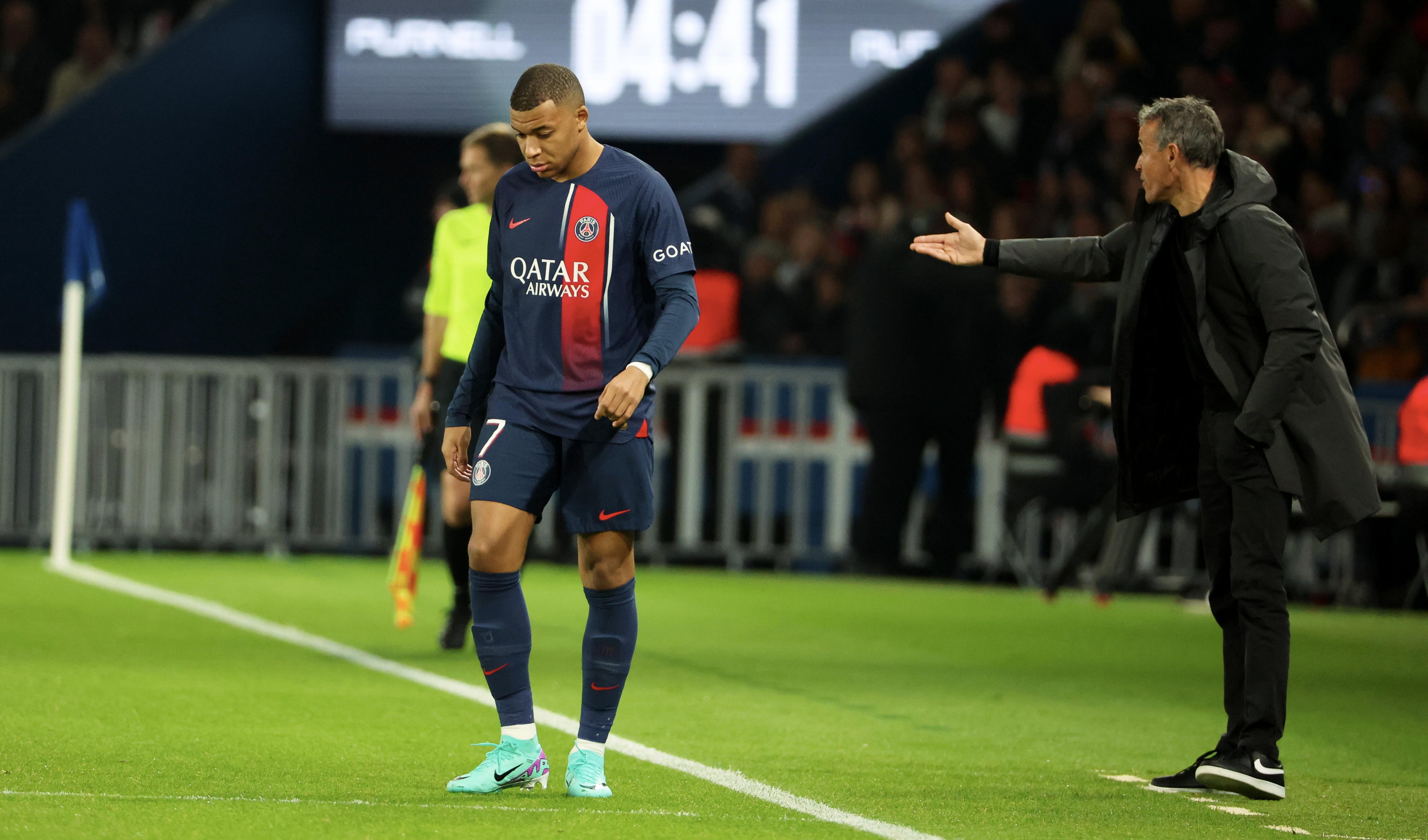 Luis Enrique y Kylian Mbappé, juntos en un partido del Paris Saint Germain de Ligue 1. (Photo by Xavier Laine/Getty Images)