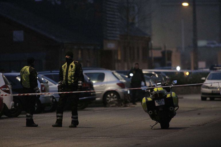 Policemen secure the area around a building in Copenhagen, Denmark, where shots were fired on February 14, 2015 outside the venue of a debate held on Islam and free speech. According to Danish media, the French ambassador to Denmark attended the discussio