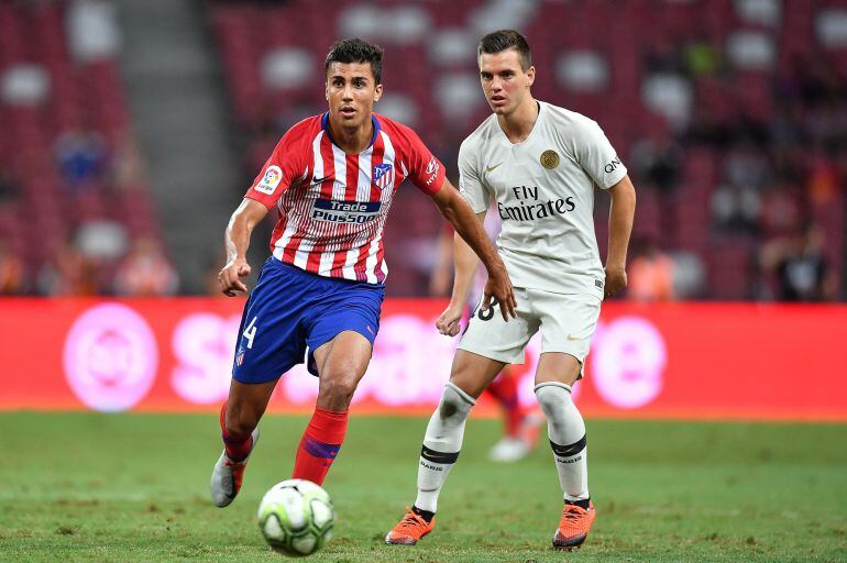 Lo Celso y Rodri, durante el partido