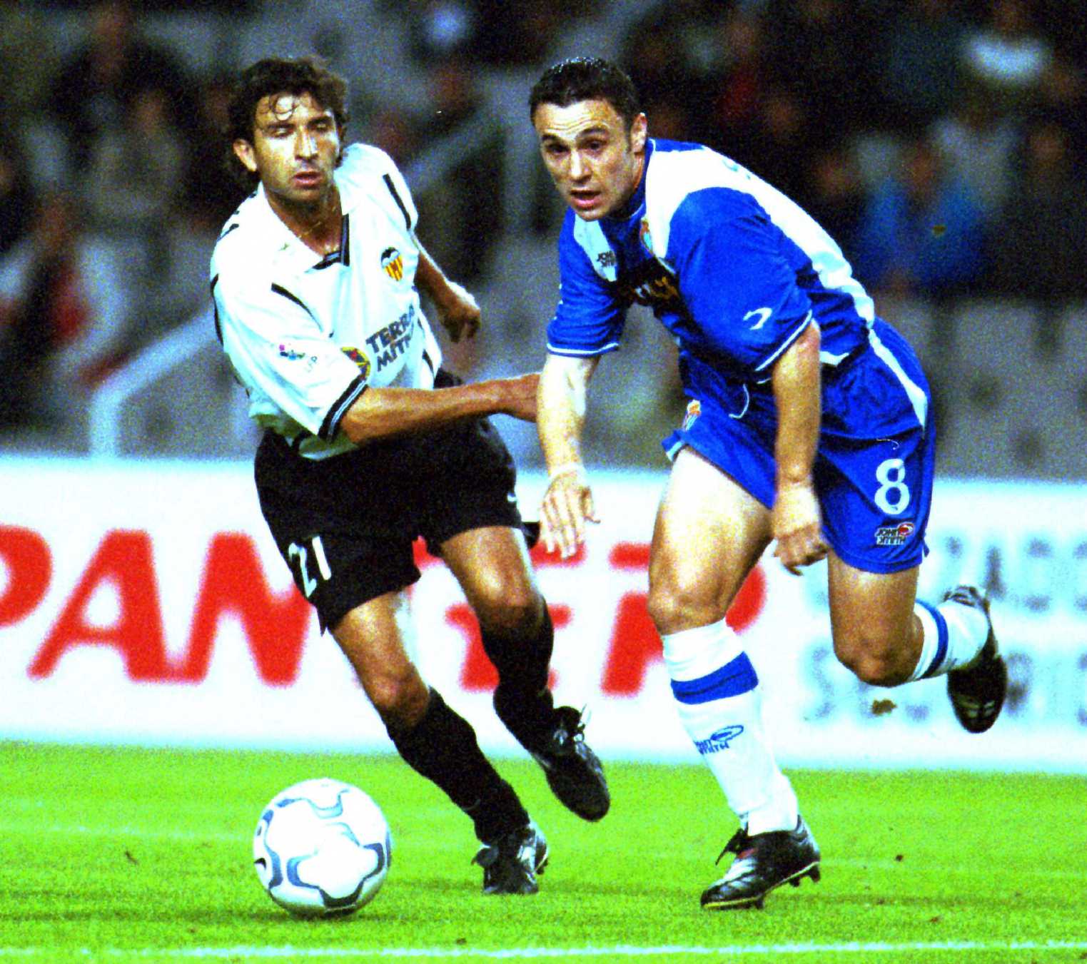 Sergio Gonzalez y Luis Milla en un partido de liga