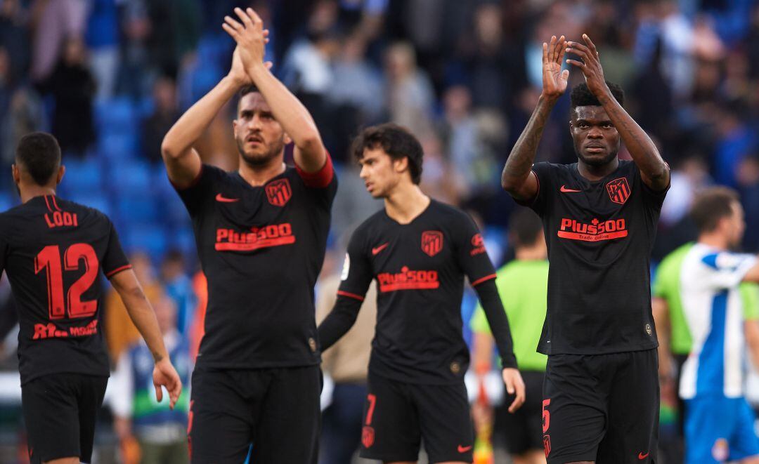 Koke y Thomas, al término del partido de Liga entre el Espanyol y el Atlético de Madrid.