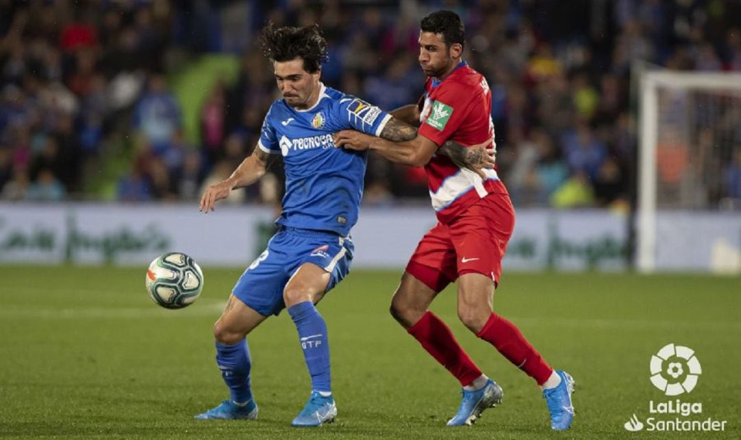 Jason Remeseiro con el Getafe ante el Granada