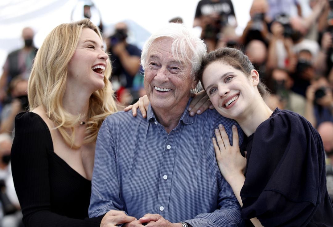 Virginie Efira, director Paul Verhoeven, and Daphne Patakia pose during the photocall for &#039;Benedetta&#039; at the 74th annual Cannes Film Festival, in Cannes, France, 10 July 2021. The movie is presented in the Official Competition of the festival which runs from 06 to 17 July