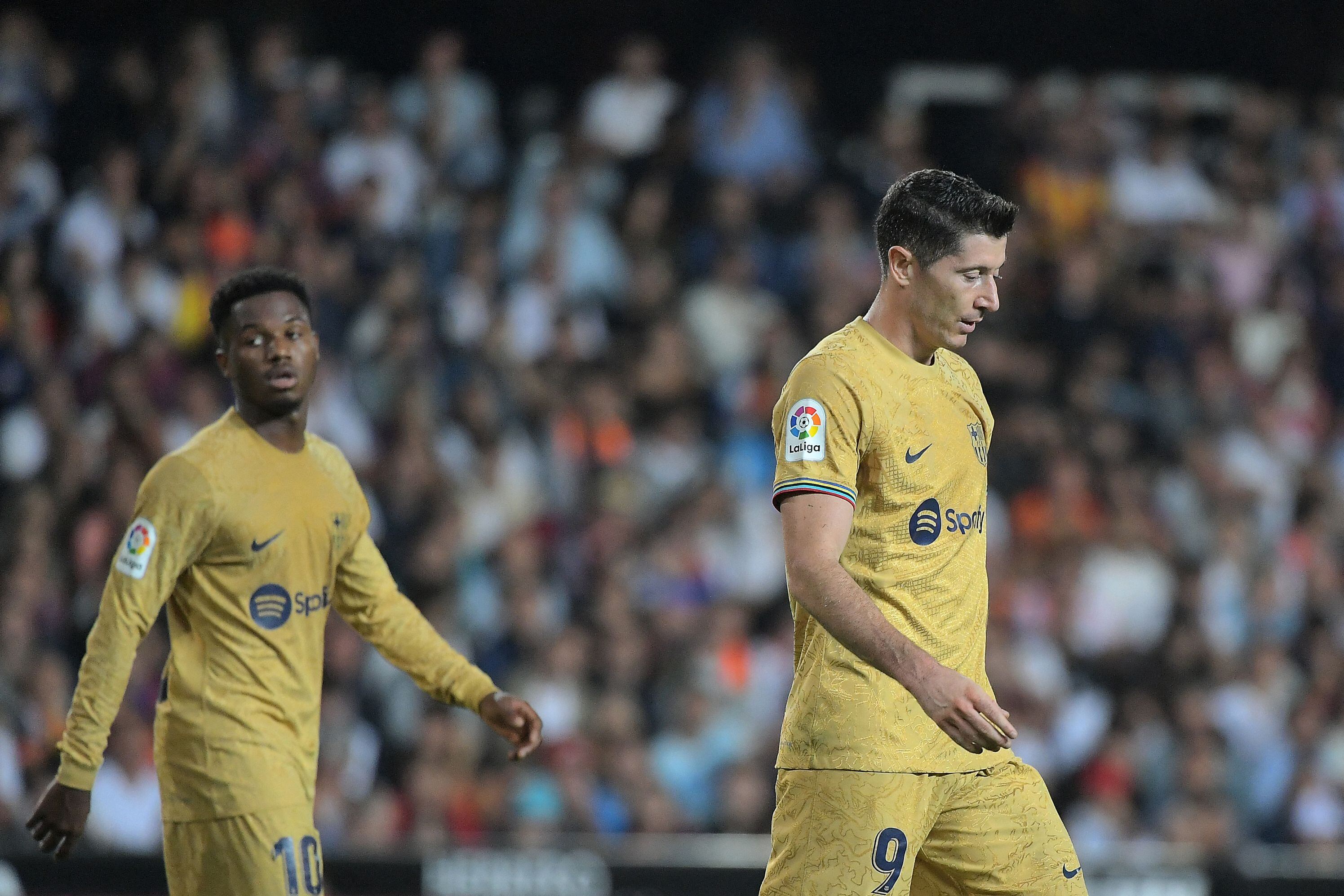 Lewandowski y Fati, durante un partido de esta temporada.