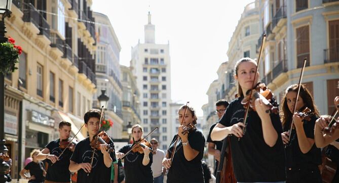 Músicos de cuerda en calle Larios en otro acto de la Fundación Musical de Málaga