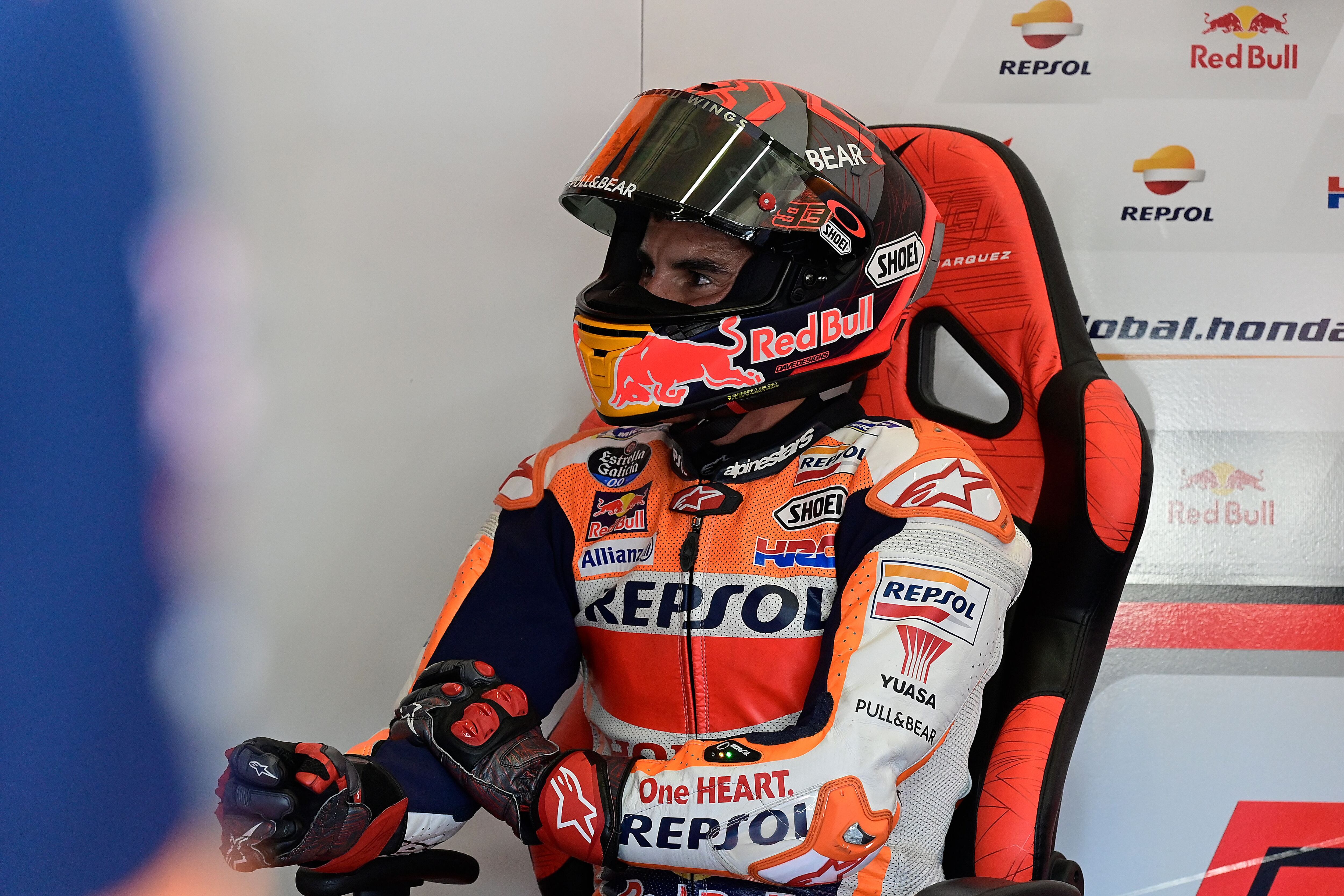 Repsol Honda Team&#039;s Spanish rider Marc Marquez gestures while holding his right arm which was operated earlier this week during the fourth MotoGP free practice session of the Andalucia Grand Prix at the Jerez race track in Jerez de la Frontera on July 25, 2020. (Photo by JAVIER SORIANO / AFP) (Photo by JAVIER SORIANO/AFP via Getty Images)