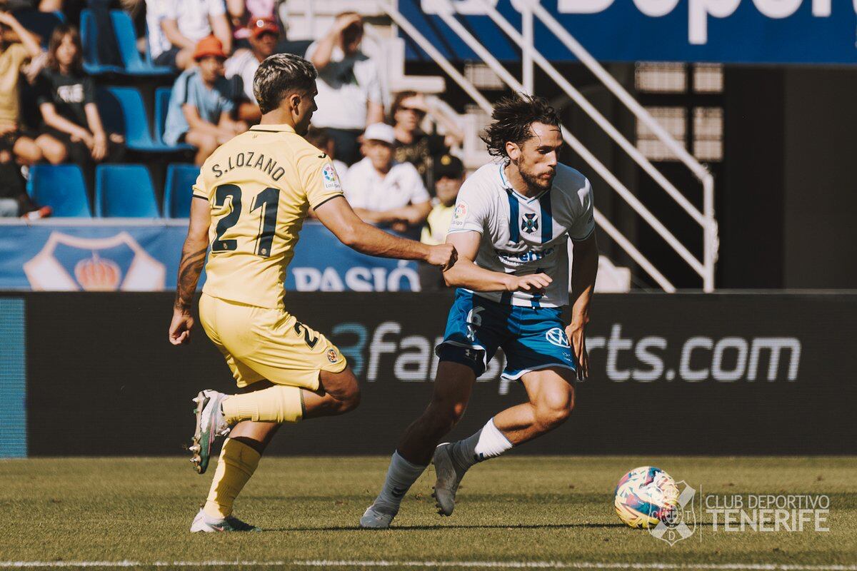 Corredera y Lozano, en un lance del partido.