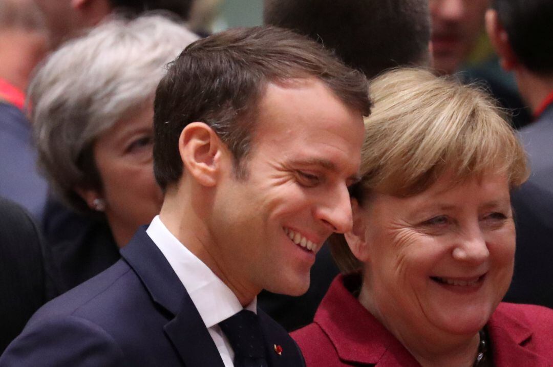 Angela Merkel y Emmanuel Macron en la cumbre de jefes de Estado y de Gobierno de la UE en Bruselas este jueves