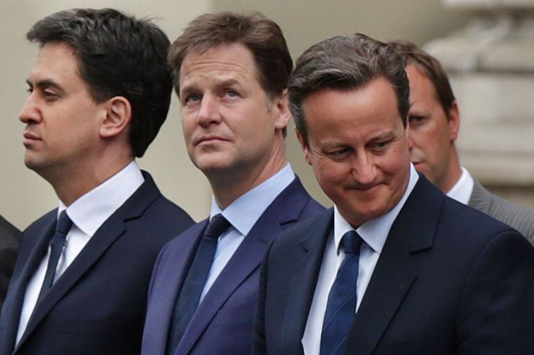 LONDON, UNITED KINGDOM - MAY 08:  (L-R) Labour leader Ed Miliband, Liberal Democrat leader Nick Clegg and Prime Minister David Cameron attend a tribute at the Cenotaph to begin three days of national commemorations to mark the 70th anniversary of VE Day M