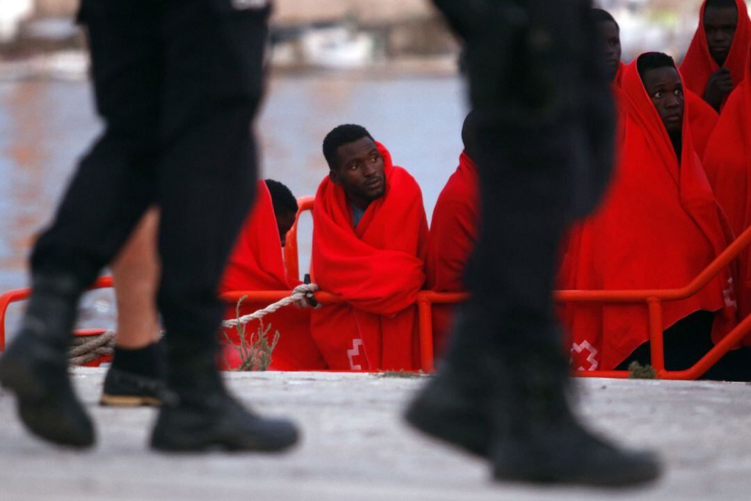 Persona rescatada de una patera por Salvamento Marítimo