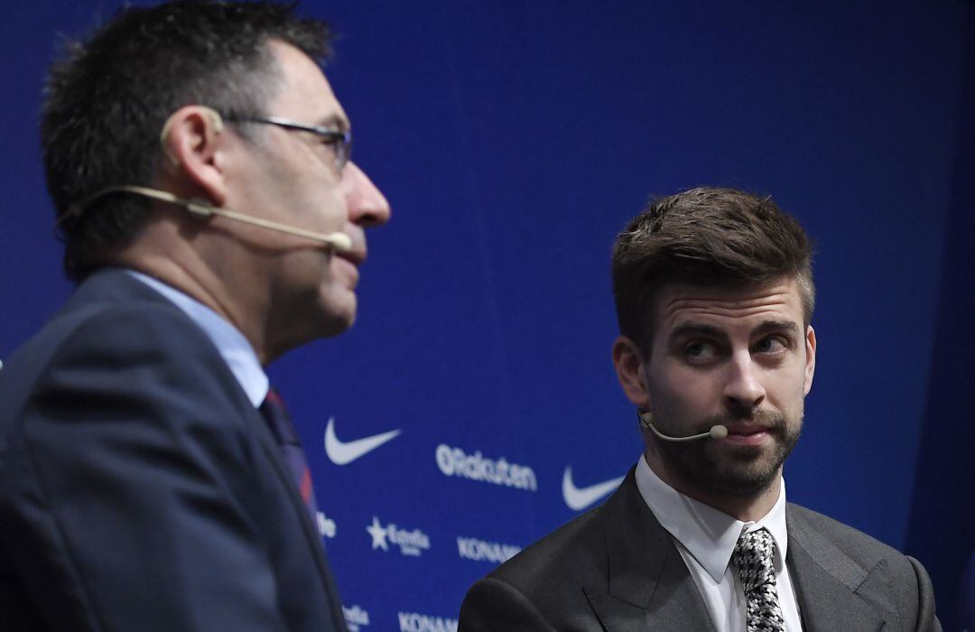 Josep María Bartomeu y Gerard Piqué