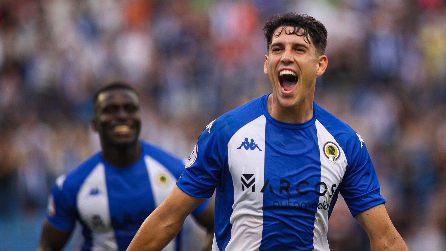 Roger Colomina, jugador del Hércules, celebra su gol frente a Torrent