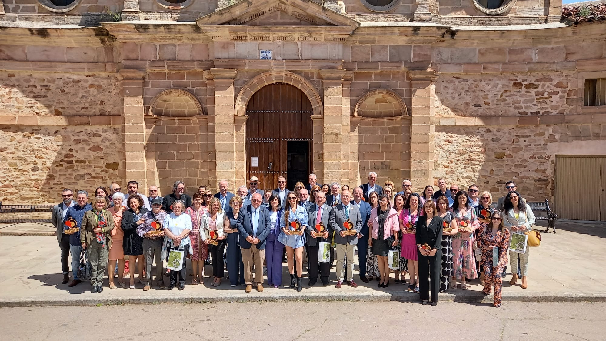 Foto de familia de los premiados en Carboneros.