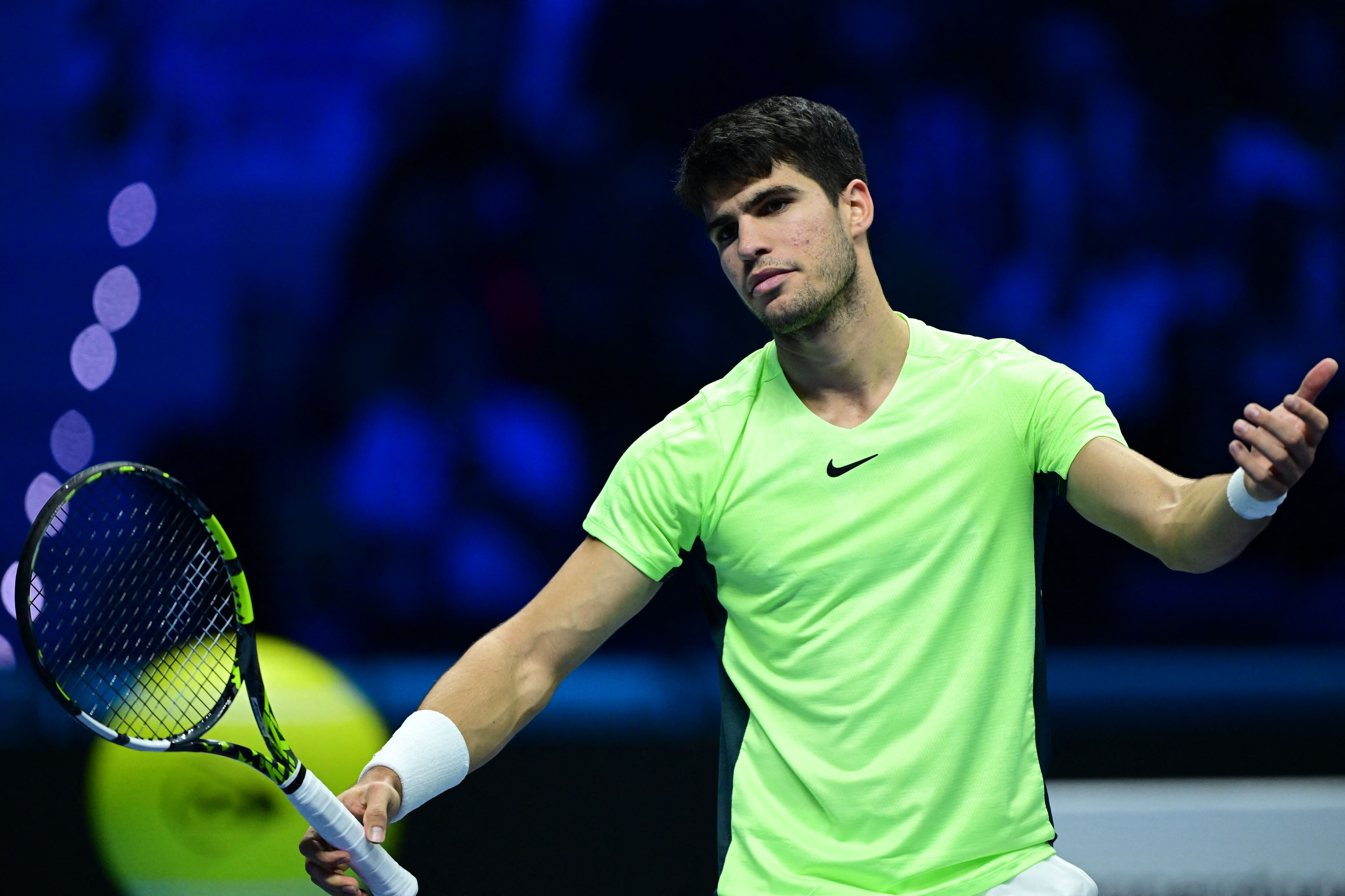 Spain&#039;s Carlos Alcaraz reacts during the semi-final match against Serbia&#039;s Novak Djokovic at the ATP Finals tennis tournament in Turin on November 18, 2023. (Photo by Tiziana FABI / AFP) (Photo by TIZIANA FABI/AFP via Getty Images)