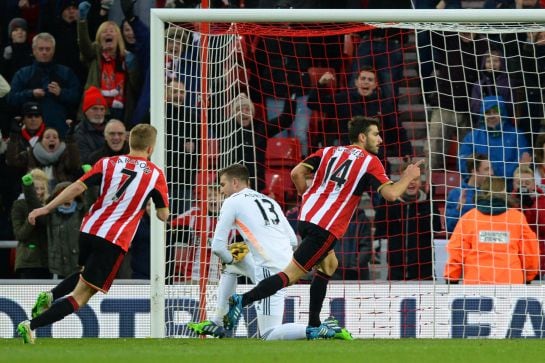 SUNDERLAND, ENGLAND - DECEMBER 13: Jordi Gomez #14 of Sunderland celebrates after scoring the opening goal from the penalty spot during the Barclays Premier League match between Sunderland and West Ham United at Stadium of Light on December 13, 2014 in Su