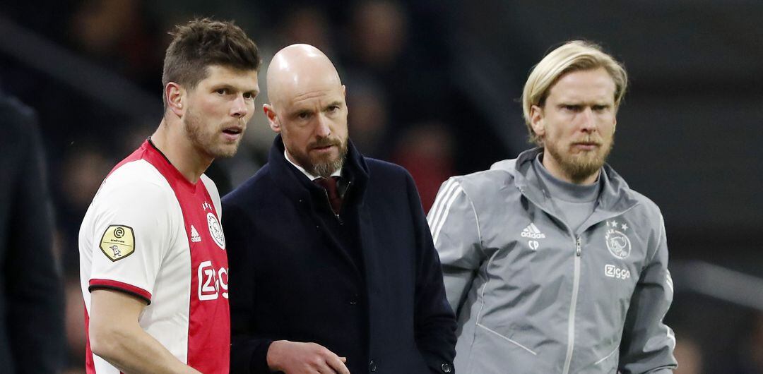 Christian Poulsen y Erik ten Hag, durante un partido del Ajax