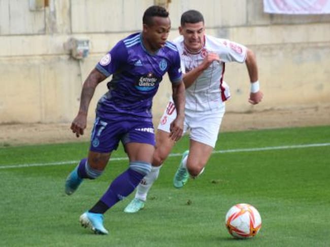 Buenacasa persigue a Paulo Vitor