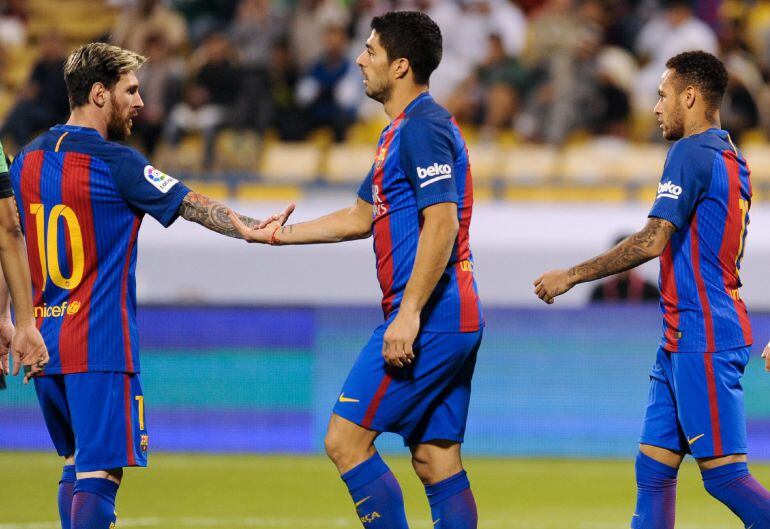 Messi, Suárez y Neymar celebran un gol ante el Al Ahli