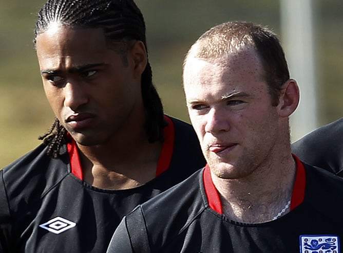 Rooney y Johnson entrenan con su selección