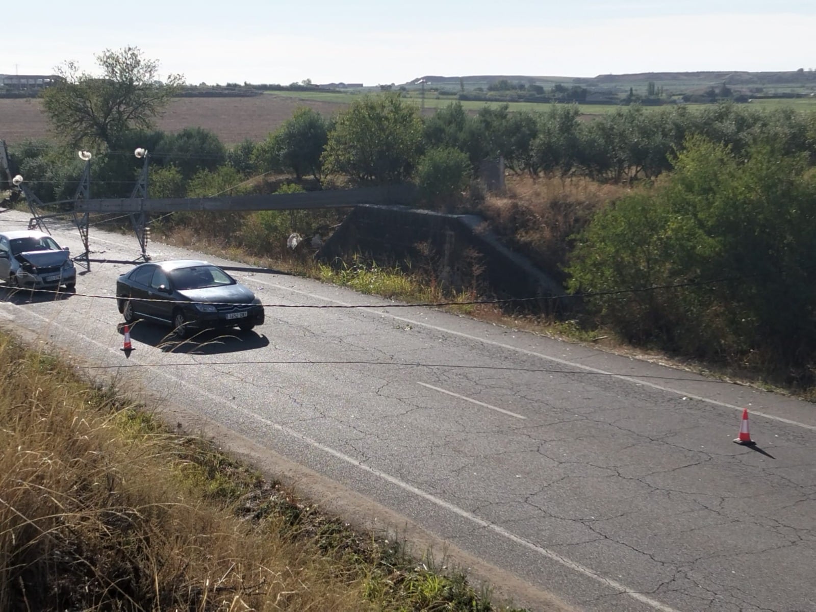 Carretera de Binéfar a Tamarite cortada por las tormentas.