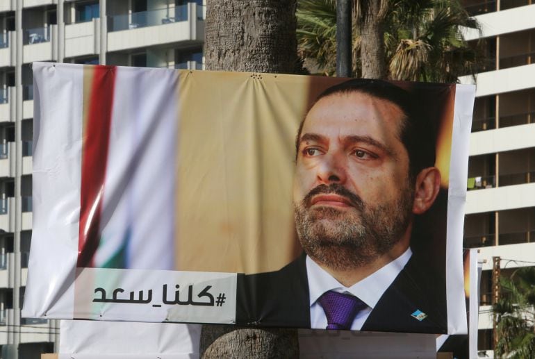  Posters del Primer Ministro del Libano al Hariri , que ha dimitido de su cargo tras recibir presiones 