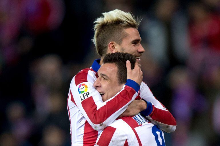 Griezmann y Mandzukic celebran un gol