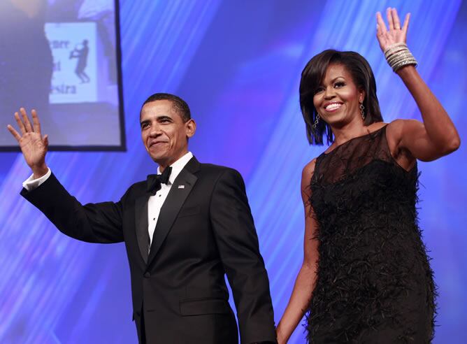 Barack Obama, junto a su esposa, Michelle