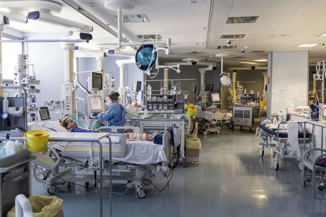 Nurses attend to a COVID-19 patient at the Intensive Care Unit (ICU) of the Pope John XXIII Hospital in Bergamo, Italy. 