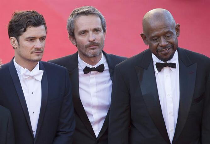 Orlando Bloom, Forest Whitaker y el director de 'Zulu', Jêrome Salle, presentando la última película proyectada en Cannes pero fuera de concurso