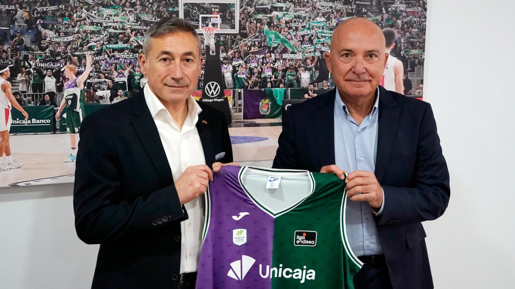 El presidente del Unicaja Antonio Jesús López Nieto junto al director general de Joma Sport Alberto López