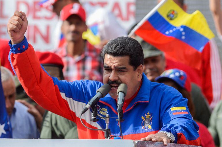 Venezuelan President Nicolas Maduro delivers a speech during a ceremony commemorating the 26th anniversary of El Caracazo --a deadly popular revolt-- in Caracas on February 28, 2015. Maduro announced he was implementing a mandatory visa system for all US 