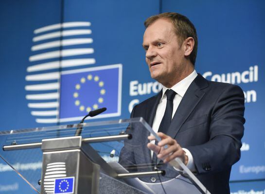 EU Council president Donald Tusk holds a joint press conference with EU Commission president during a European Council summit at the Council of the European Union (EU) Justus Lipsius building in Brussels on March 20, 2015. AFP PHOTO / JOHN THYS