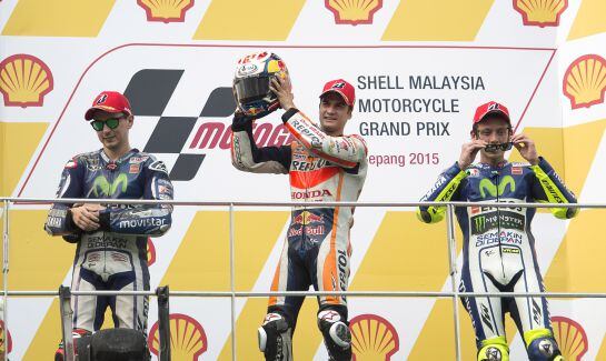 Lorenzo, Pedrosa y Rossi, en el podio de la carrera de Malasia.