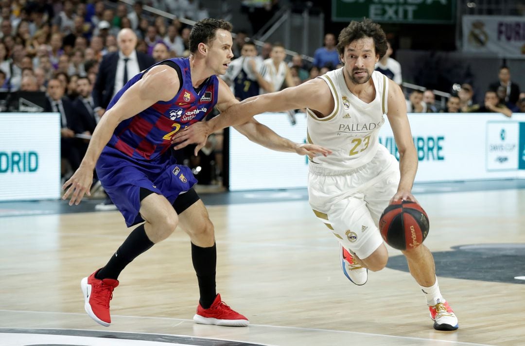 Kyle Kuric y Sergio Llull, ambos positivos por COVID, en una fotografía de archivo. 