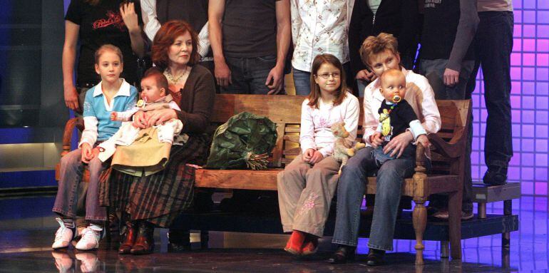 (FILES) This photo taken on December 11, 2005 shows then 55-old Annegret Raunigk (1st row, 2ndL), posing with her youngest daugher Lelia (on her knees) and other children and grand-children in Cologne as guest in a German channel RTL show xAB2005! People,